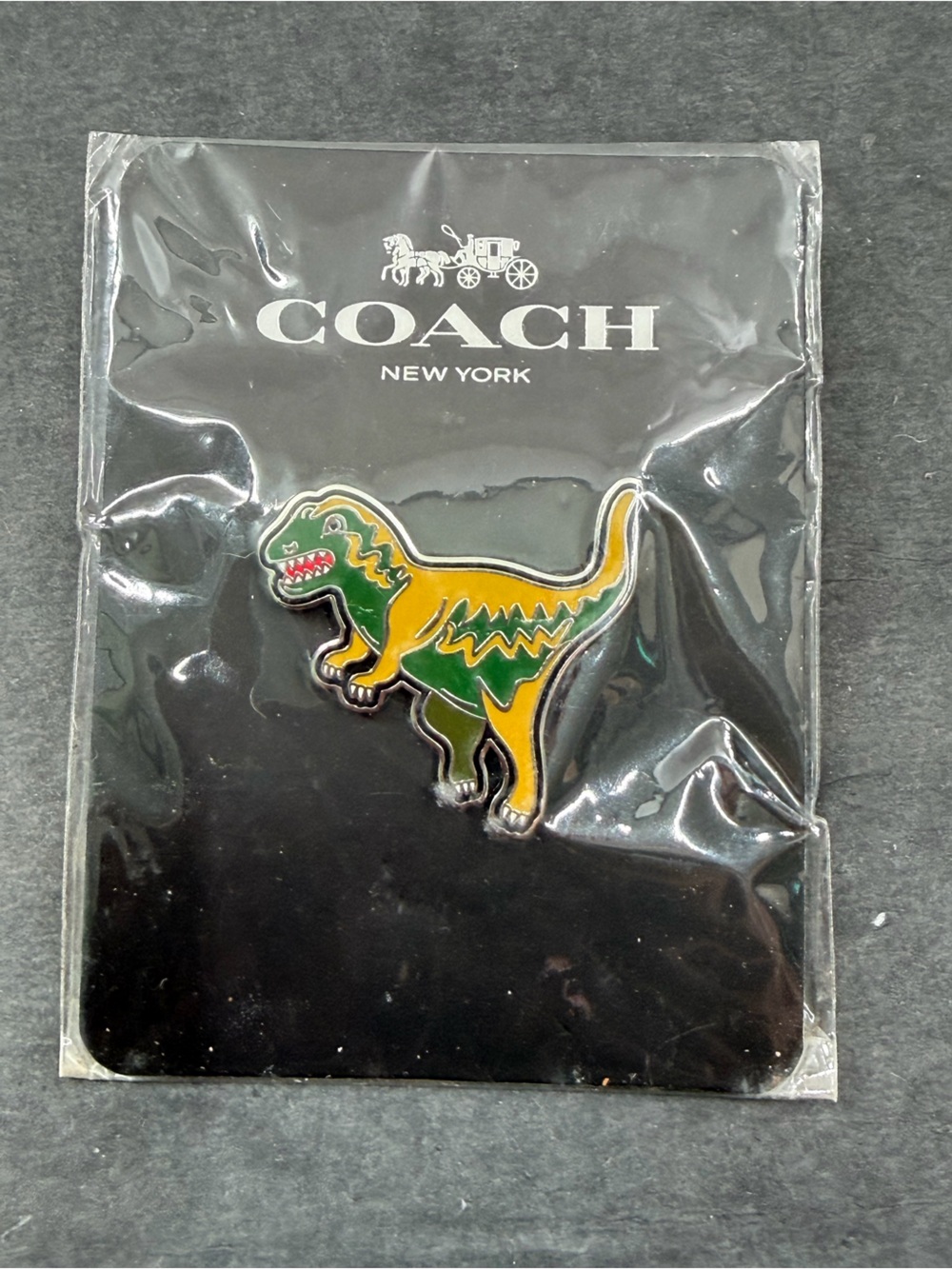 NIP Coach Rexy Pin - Picture 2 of 4